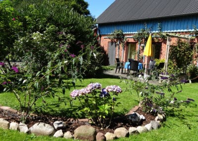 wohnwerth.de Traumferienwohnung Ostsee Seminarraum Haupthaus Südseite mit Terrasse